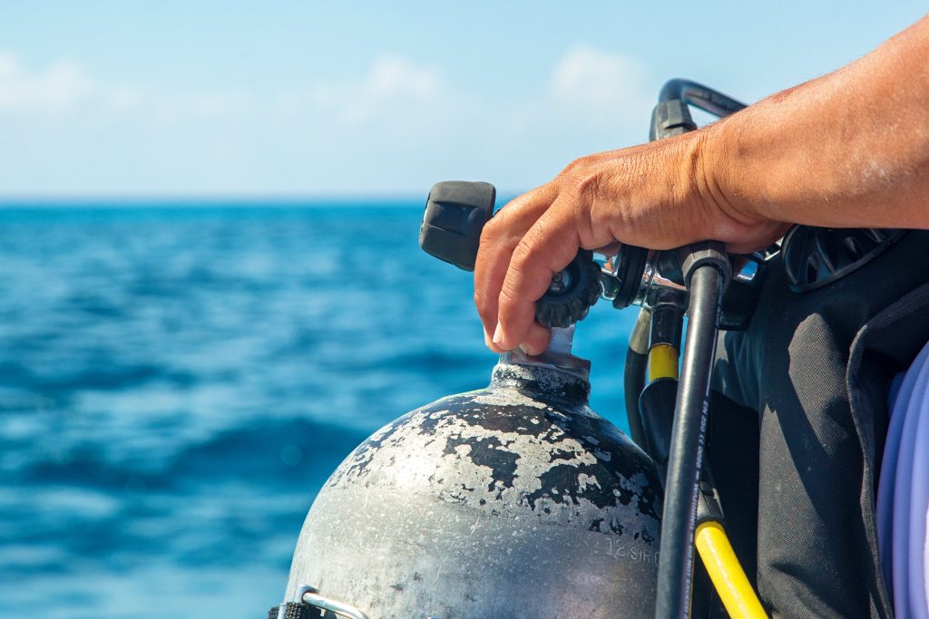 scuba diver with the right tools