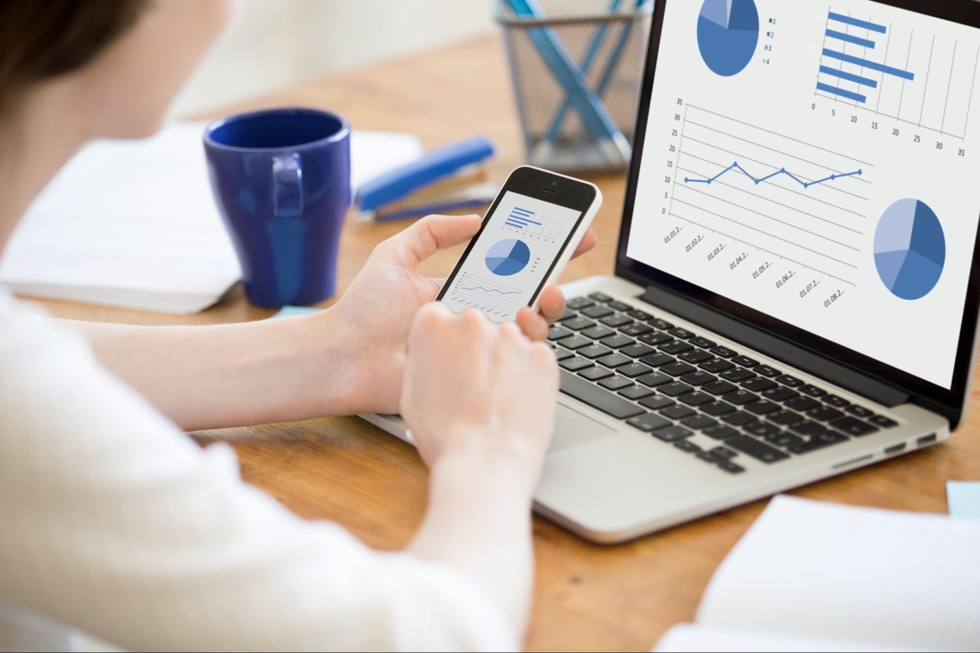 Businesswoman analyzing 2025 marketing strategy performance metrics